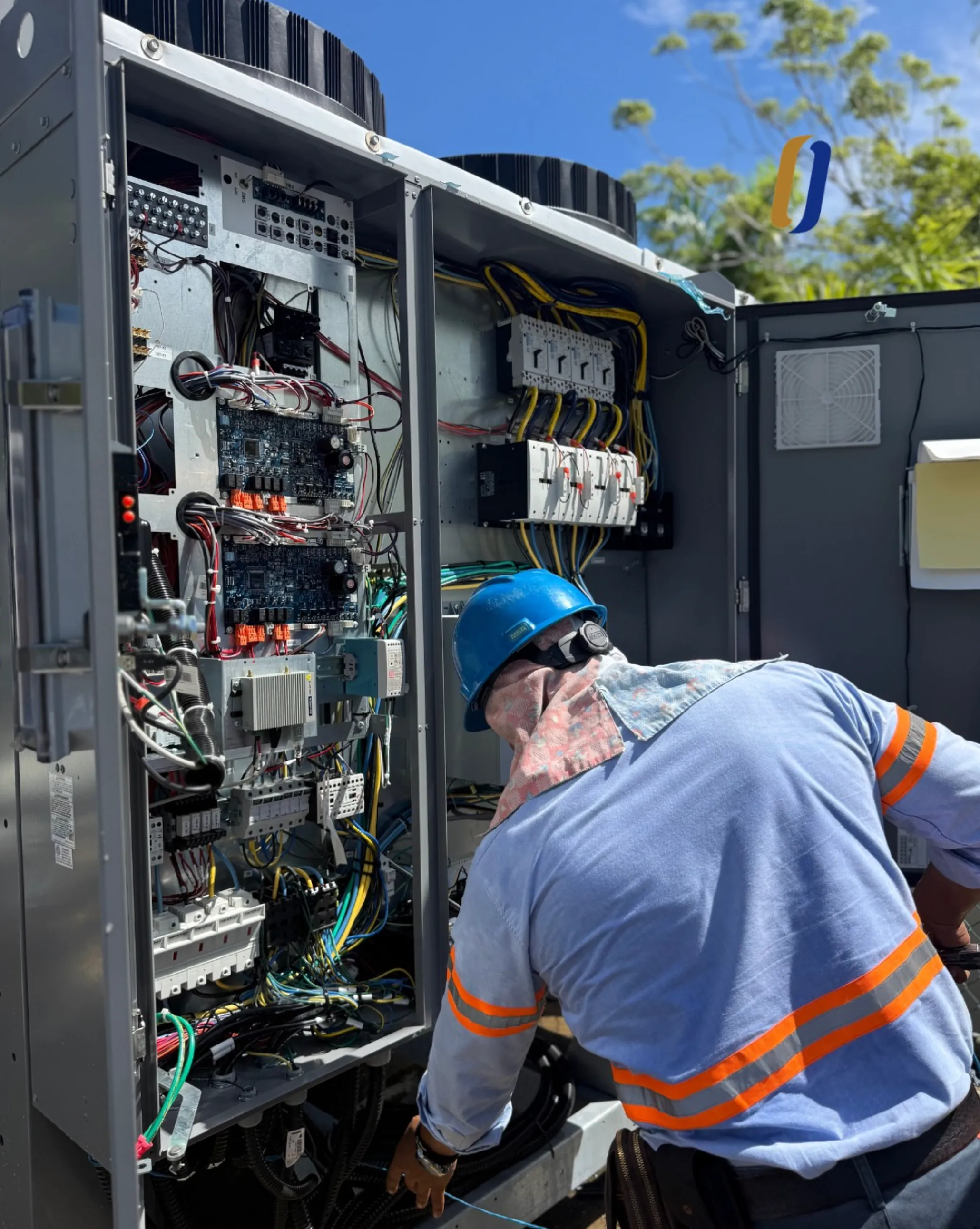ODESA technician working on an electrical control panel
