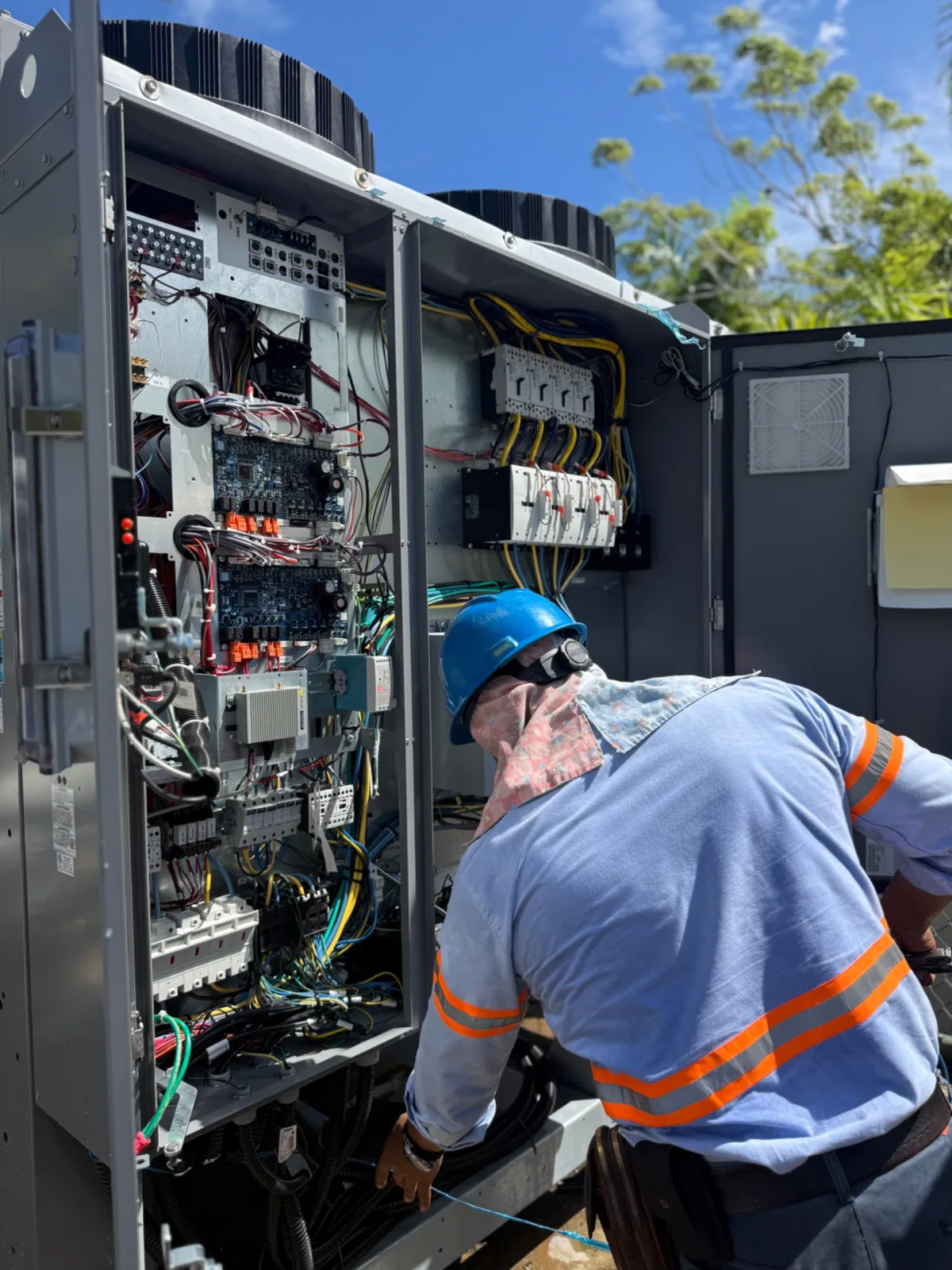 ODESA technician working on an electrical control panel